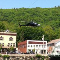 Helicopter flying over the village during the filming of The Judge